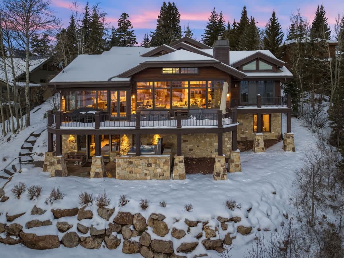 Mountain vacation home at sunset